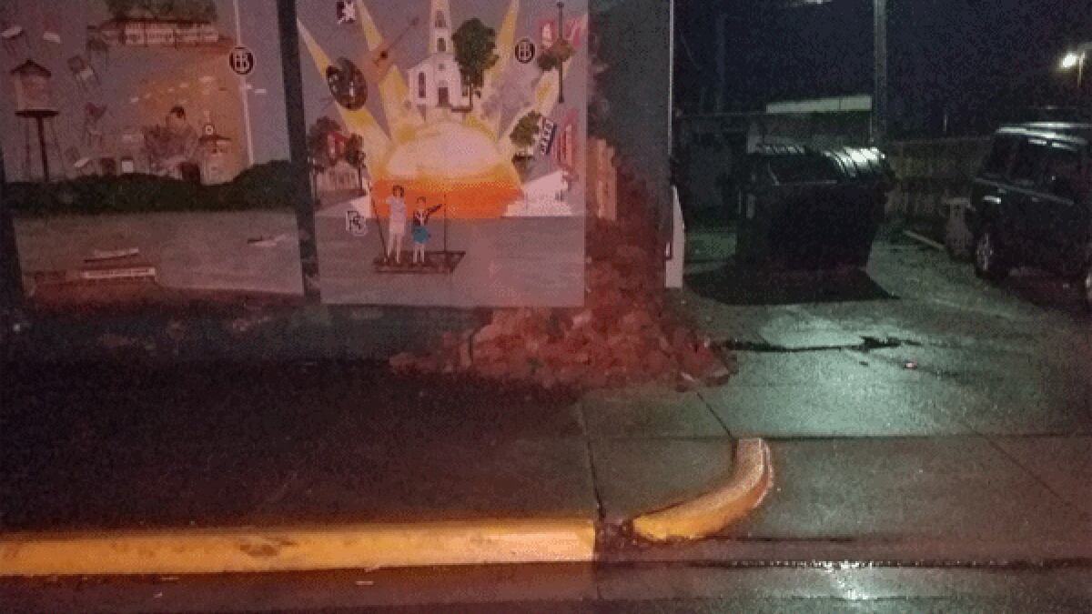 Bricks from a building fell down onto the sidewalk at Main and Poplar streets in Rising Sun...