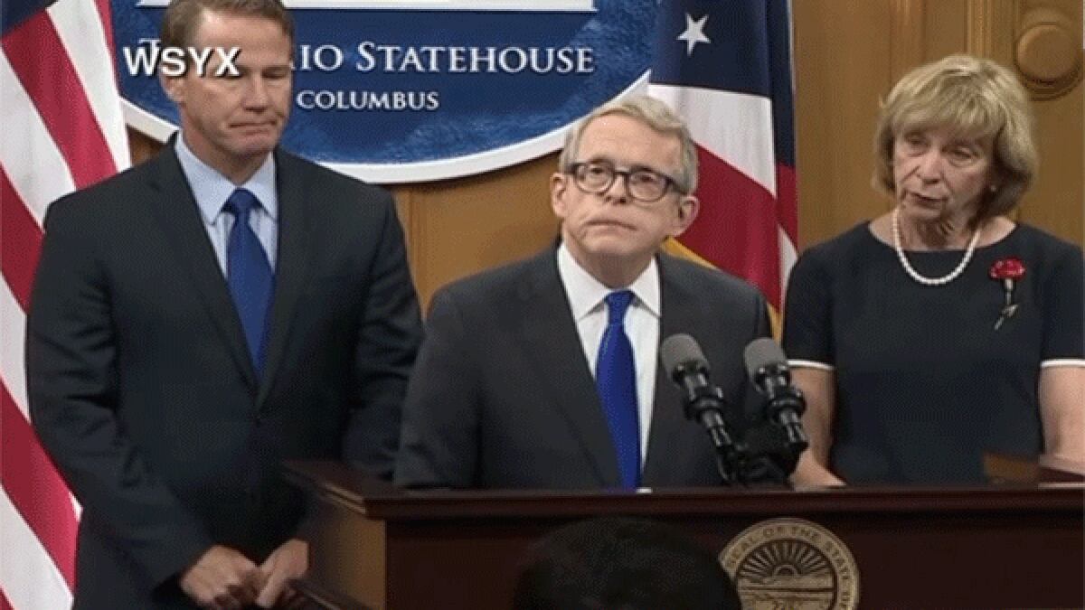 Ohio Gov. Mike DeWine calls for background checks on gun sales, red-flag law after a mass...