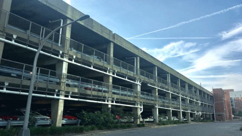 More than a dozen vehicles were broken into, and one was stolen early Wednesday from this...
