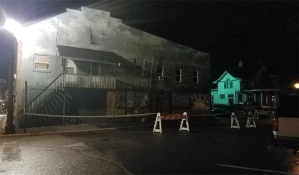 A back wall partially collapsed on this building at Main and Poplar streets in Rising Sun early...