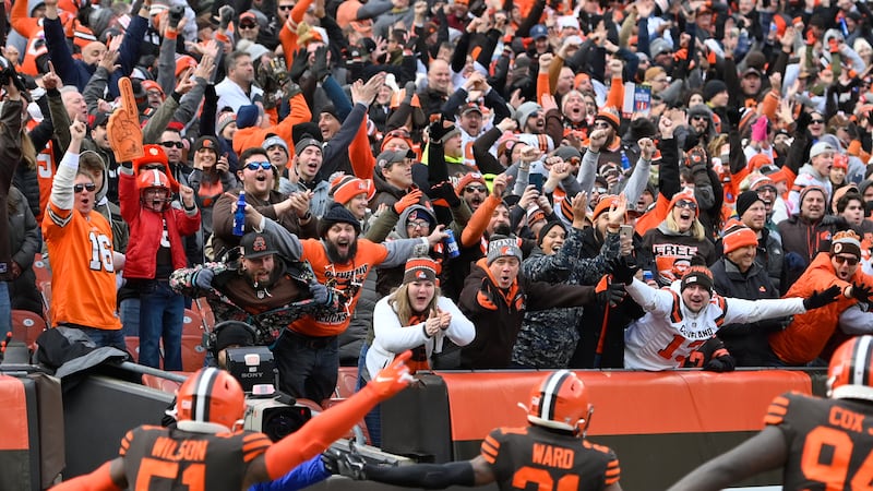 Cleveland Browns cornerback Denzel Ward (21) celebrates his touchdown with fans during an NFL...