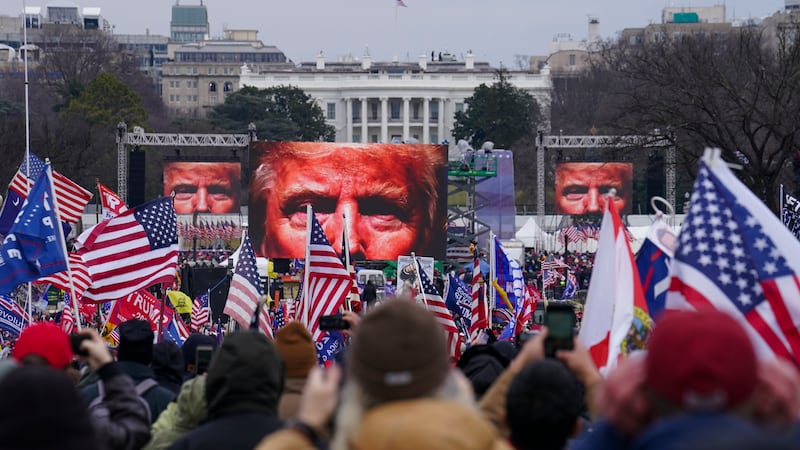 FILE - In this Jan. 6, 2021 file photo, Trump supporters participate in a rally in Washington....