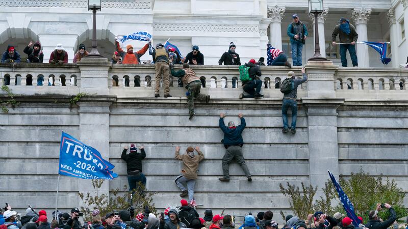 FILE - In this Jan. 6, 2021 file photo, violent insurrectionists loyal to President Donald...