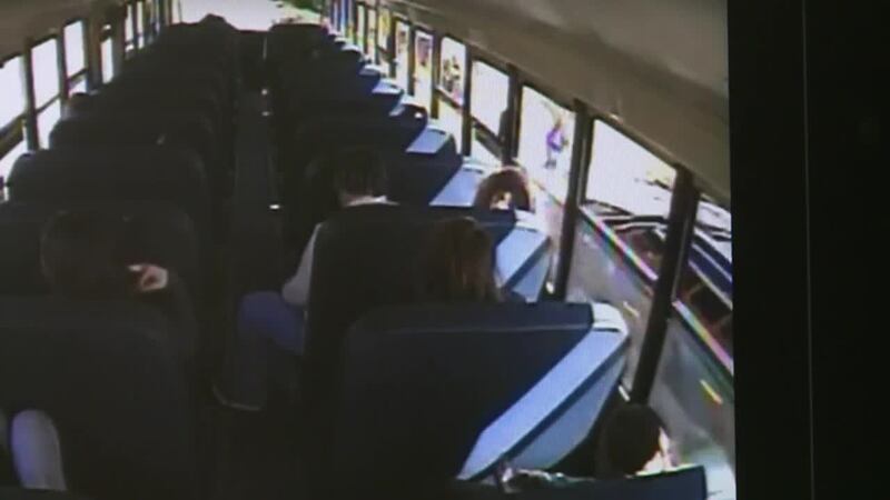 A driver is facing charges after a student was nearly hit by a car while getting off a school...