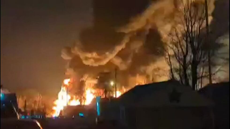 Hazmat teams in Ohio raced to contain a fiery train derailment.