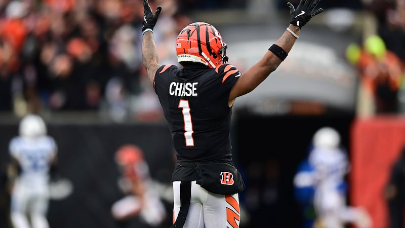 Cincinnati Bengals wide receiver Ja'Marr Chase (1) celebrates a touchdown in the first half...