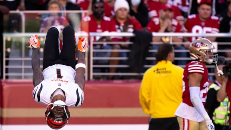 Cincinnati Bengals wide receiver Ja'Marr Chase (1) flips after scoring a touchdown in the...