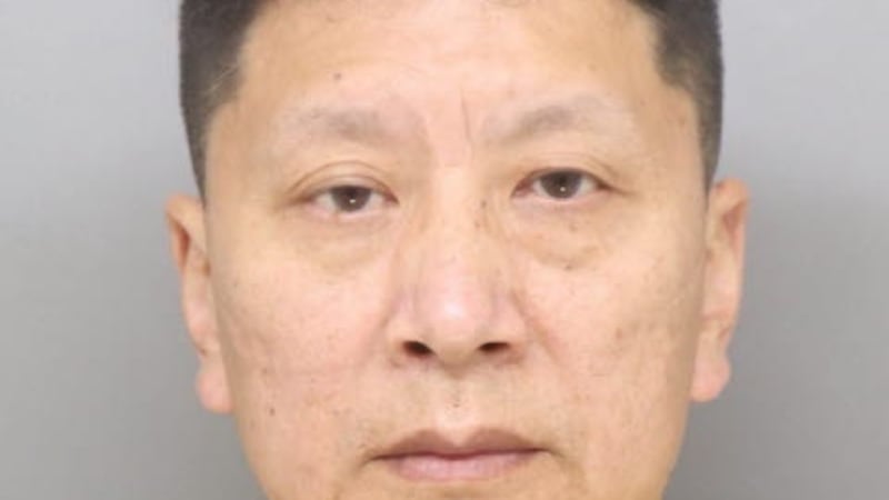 Zhongping Sun, 53, is charged with pandering obscenity involving a minor and unlawful sexual...