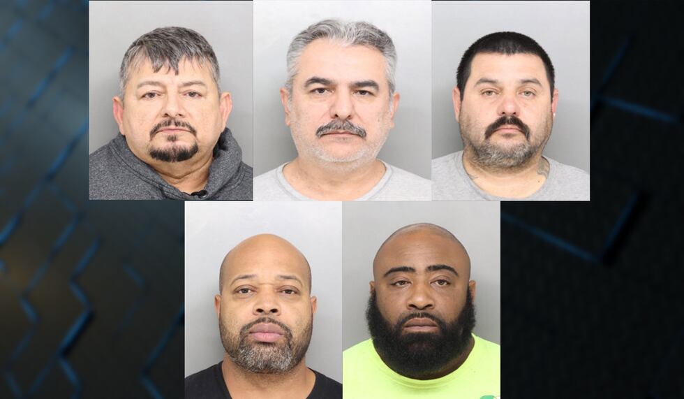 Officials arrested (left to right) Mauricio Inocenio, 63, and Cesar Garcia, 54, both of...