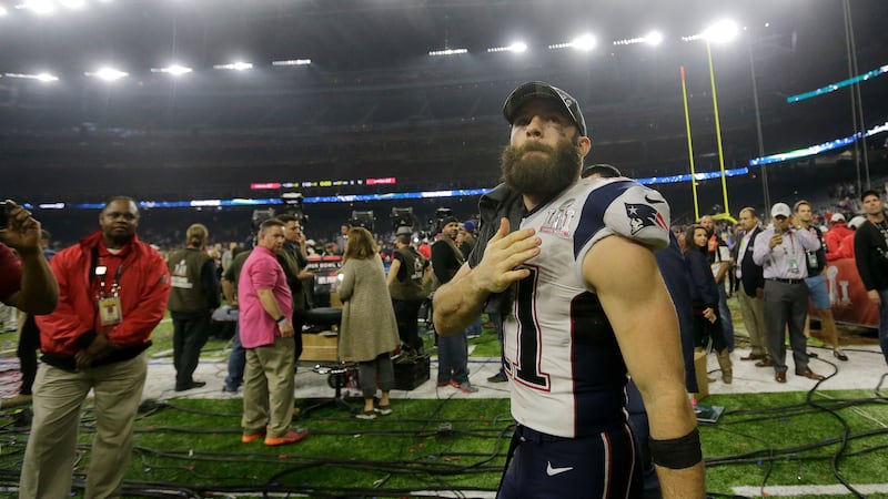 New England Patriots' Julian Edelman celebrates after the NFL Super Bowl 51 football game...
