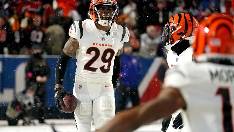 Cincinnati Bengals cornerback Cam Taylor-Britt (29) celebrates an interception with Cincinnati...