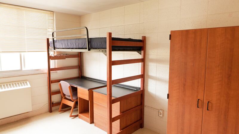 A father died Saturday while helping his son move onto campus, police said.
