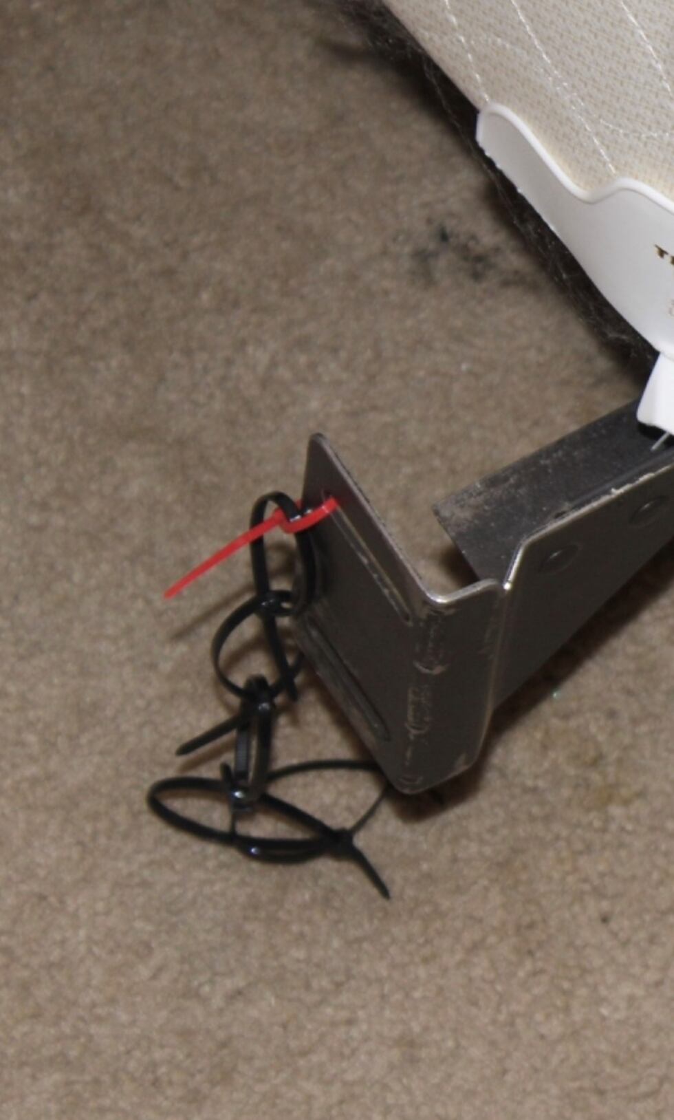 James Evans is heard on a recording from an officer’s bodycam explaining that he used zip ties...