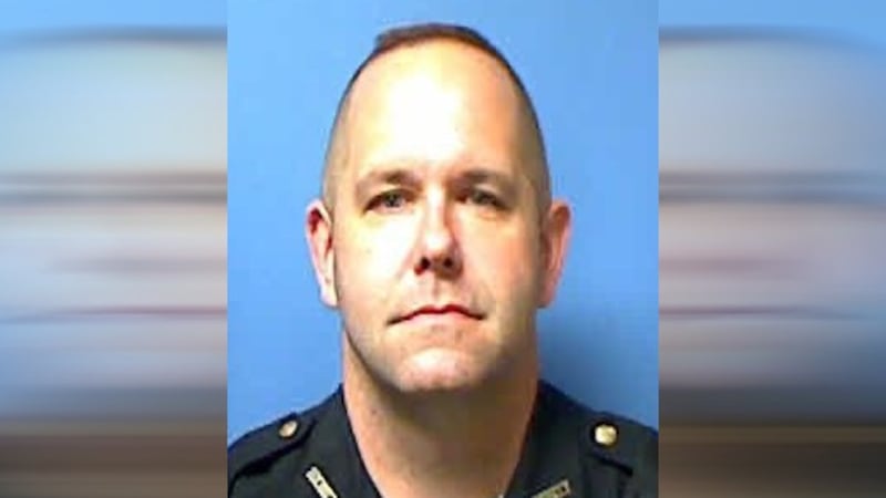 Hamilton County K9 officer William Holmes is charged with domestic violence.
