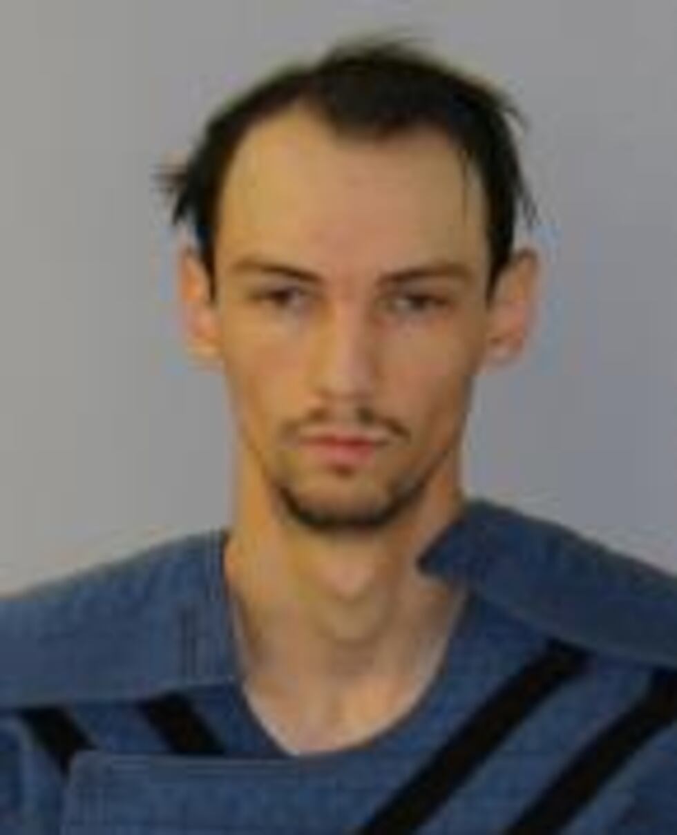 Austin Combs, 26, was arrested after allegedly shooting and killing his neighbor in Okeana...