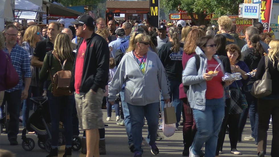 Crowds pack downtown New Albany for Harvest Homecoming.