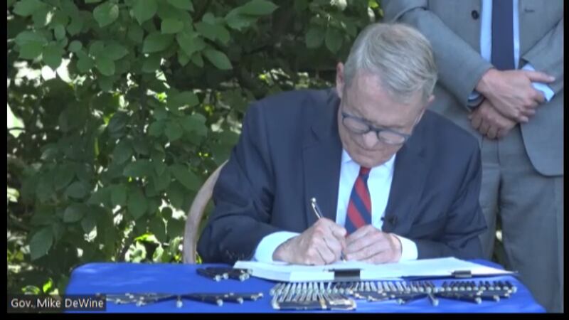 Ohio Governor Mike DeWine signs House Bill 377. The bill pledges $500 million to Ohio's...