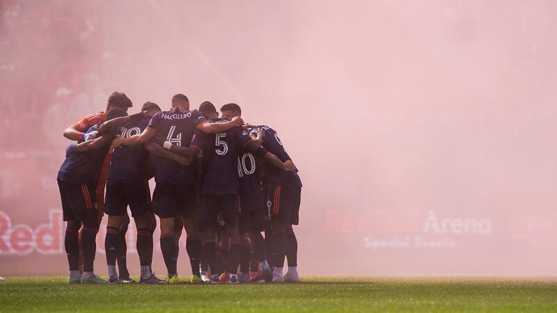 FC Cincinnati huddle up during an MLS soccer playoff match against the New York Red Bulls,...